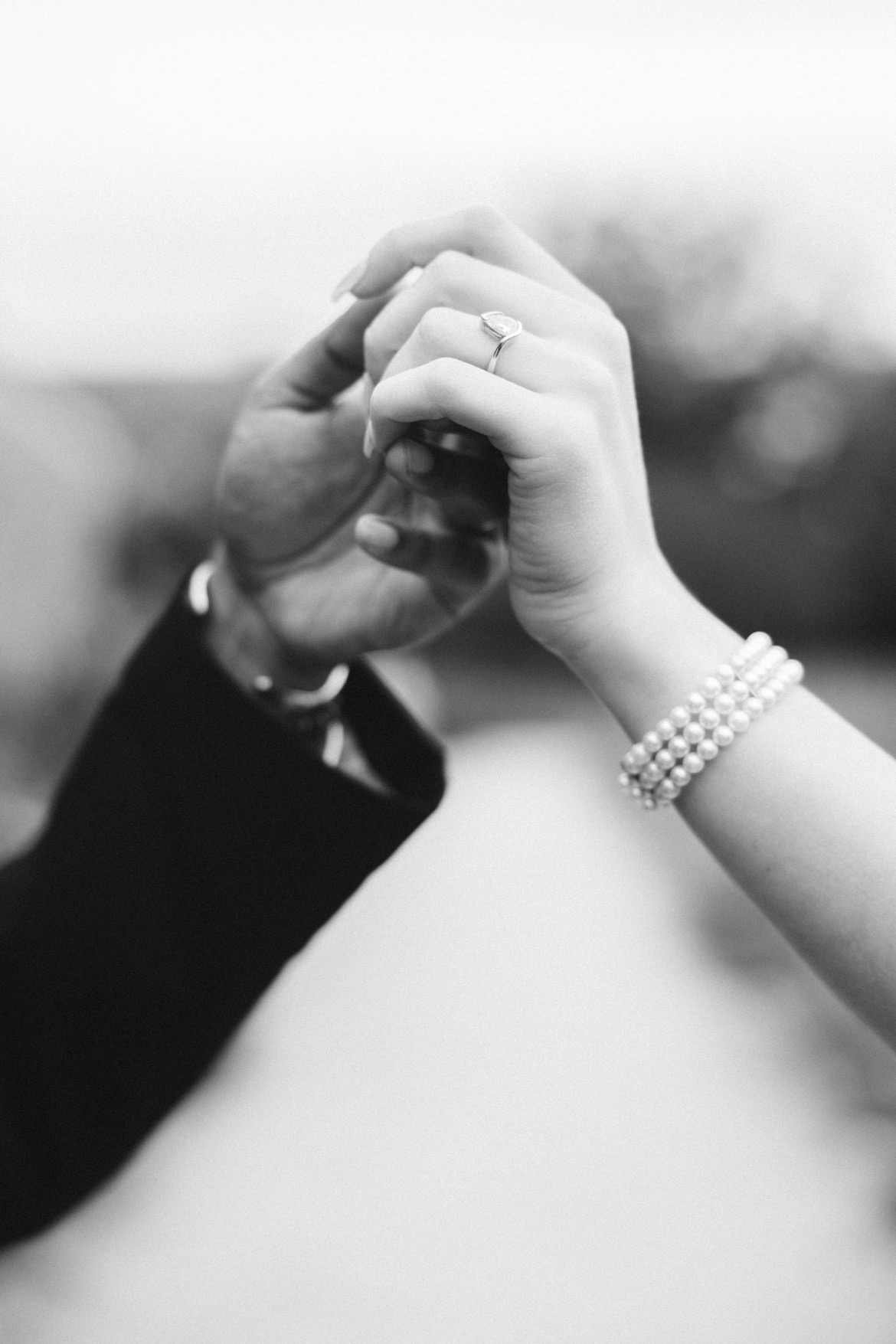 A couple holding the hands together